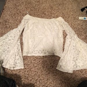 Lace off the shoulder top with bell sleeves